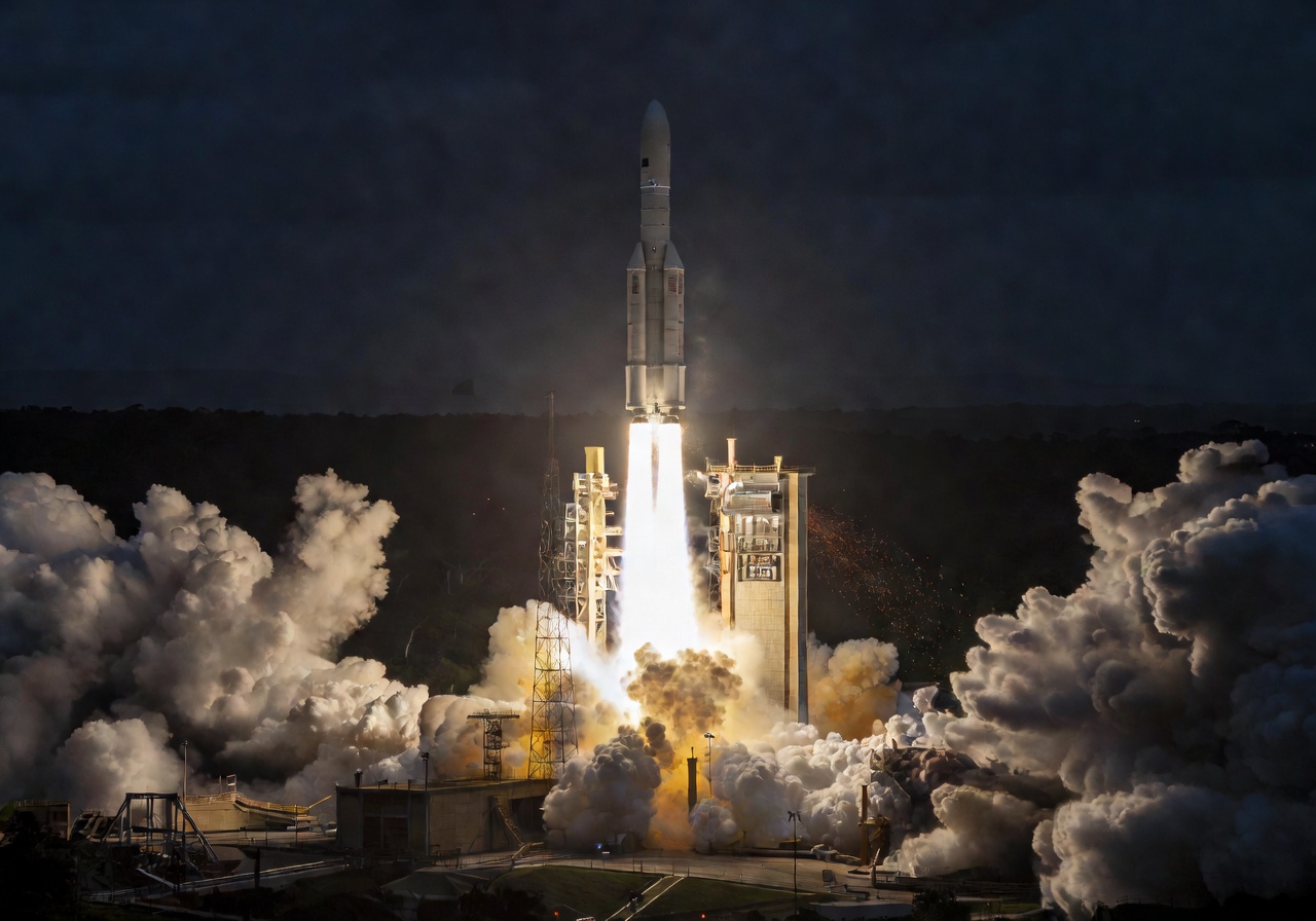 Ariane rocket launching at night from European spaceport in Kourou